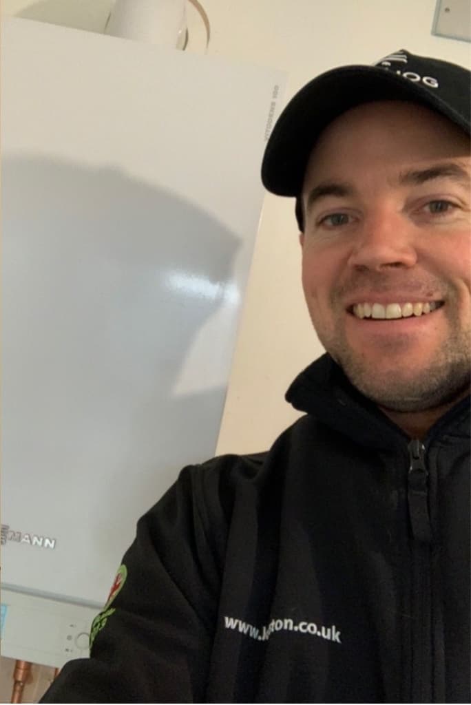 Brad Kuhlmey, Gas Safe registered plumber in Wetherby, with a Viessmann boiler